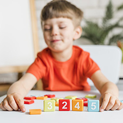 kid-playing-with-numbers